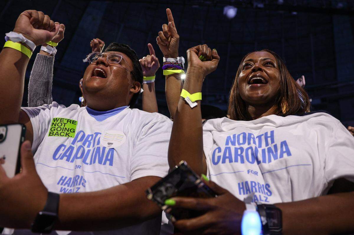 Supporters young and old cheer for Vice President Kamala Harris as she speaks during a rally at the Bojangles Coliseum in Charlotte, NC on Thursday, September 12, 2024.