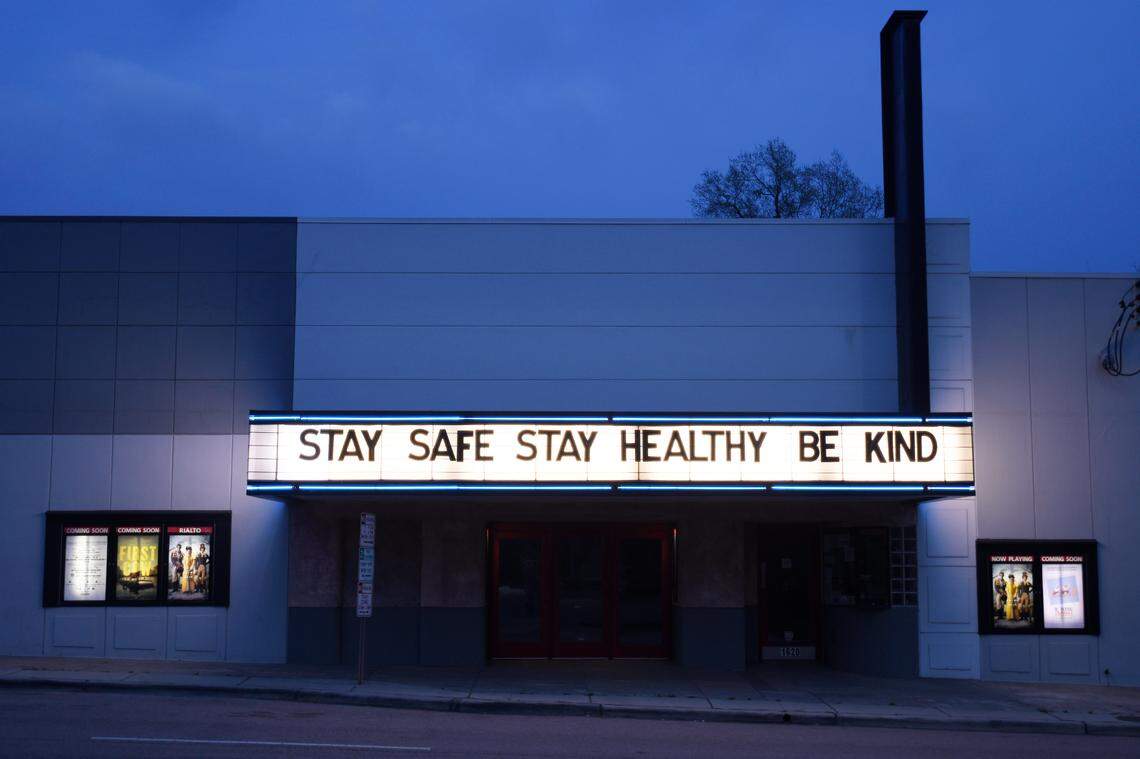 The marquee of the closed Rialto Theater on Glenwood Avenue displays a message during the COVID-19 coronavirus outbreak in N.C. Saturday night, March 21, 2020.