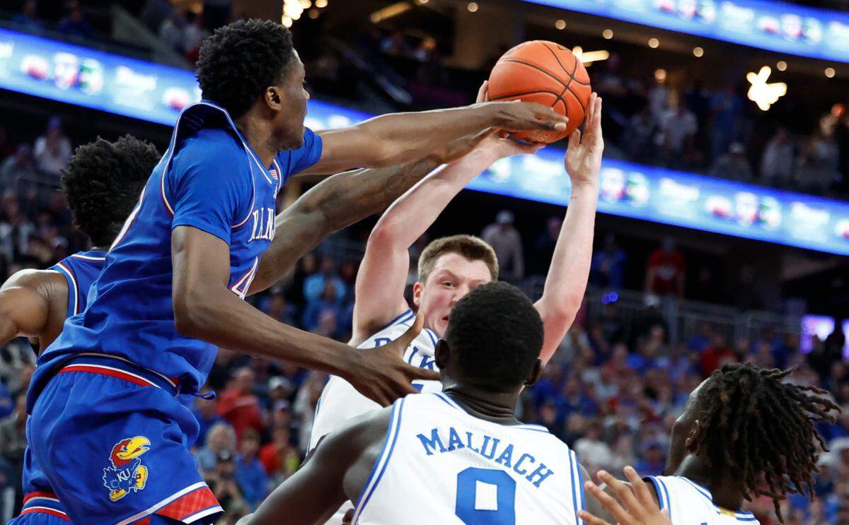 Duke’s Kon Knueppel (7) turns the ball over with three seconds left in the game during Kansas’ 75-72 victory over Duke in the Vegas Showdown at T-Mobile Arena in Las Vegas, Nev., Tuesday, Nov. 26, 2024.