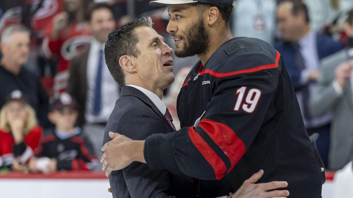 Carolina Hurricanes win leads to special moment for K’Andre Miller and baby son