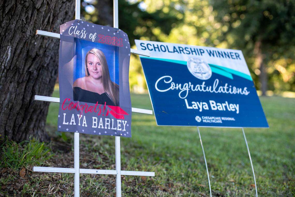 A sign in her front yard celebrates Laya Barley’s graduation from Cape Hatteras Secondary School on Wednesday, June 30, 2021 in Buxton, N.C. Barley grew up on Hatteras Island and will attend East Carolina University to study nursing.