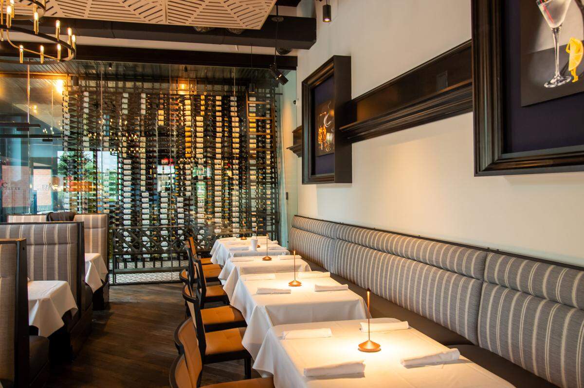 At Epic Chophouse, the wine collection is a design feature in the dining room.