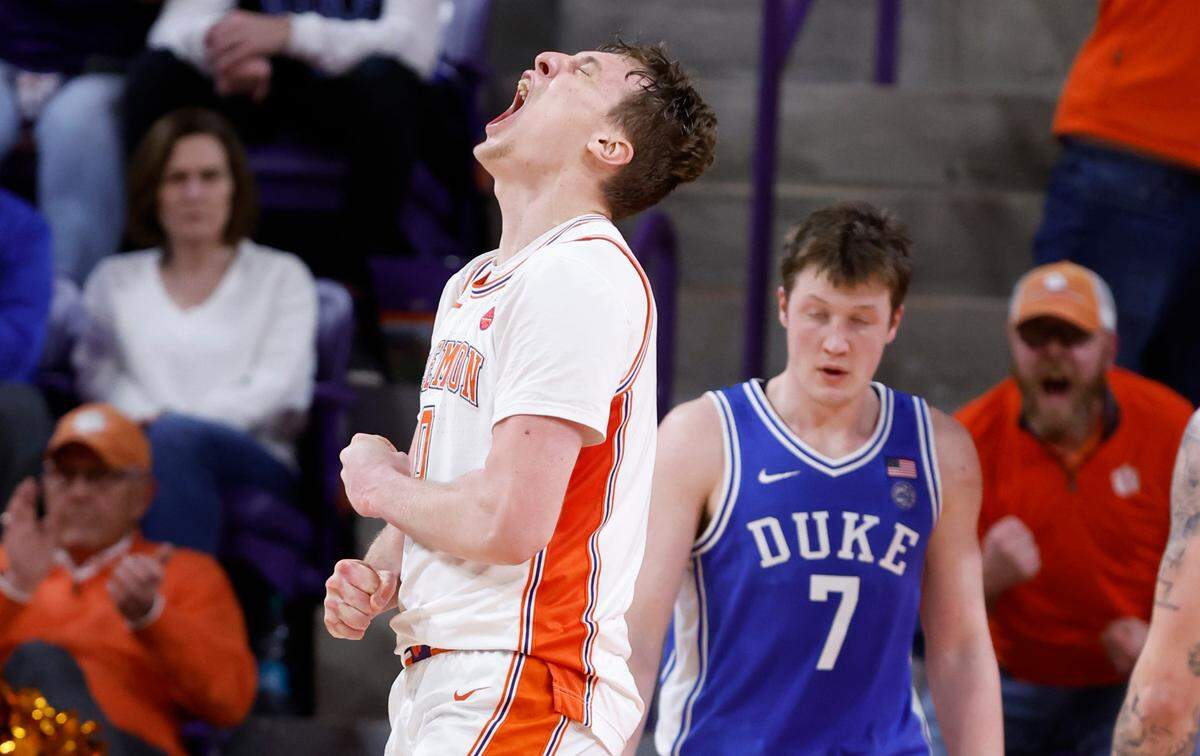 Clemson’s Viktor Lakhin (0) celebrates after making the basket while being fouled during second half Clemson’s 77-71 victory over Duke at Littlejohn Coliseum in Clemson, S.C., Saturday, Feb. 8, 2025.