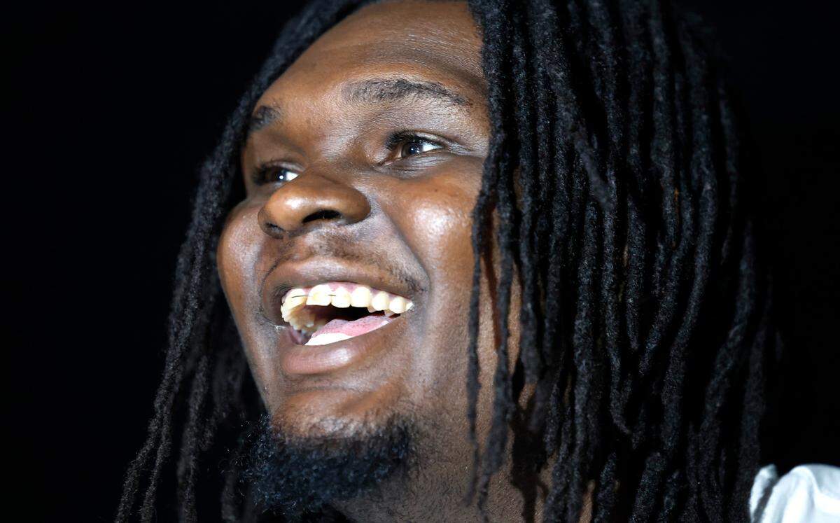 N.C. State’s DJ Burns Jr. laughs as he answers a question during a press availability at the American Airlines Center in Dallas, Texas, Saturday, March 30, 2024. Duke and N.C. State will play Sunday for a trip to the NCAA Tournament Final Four.