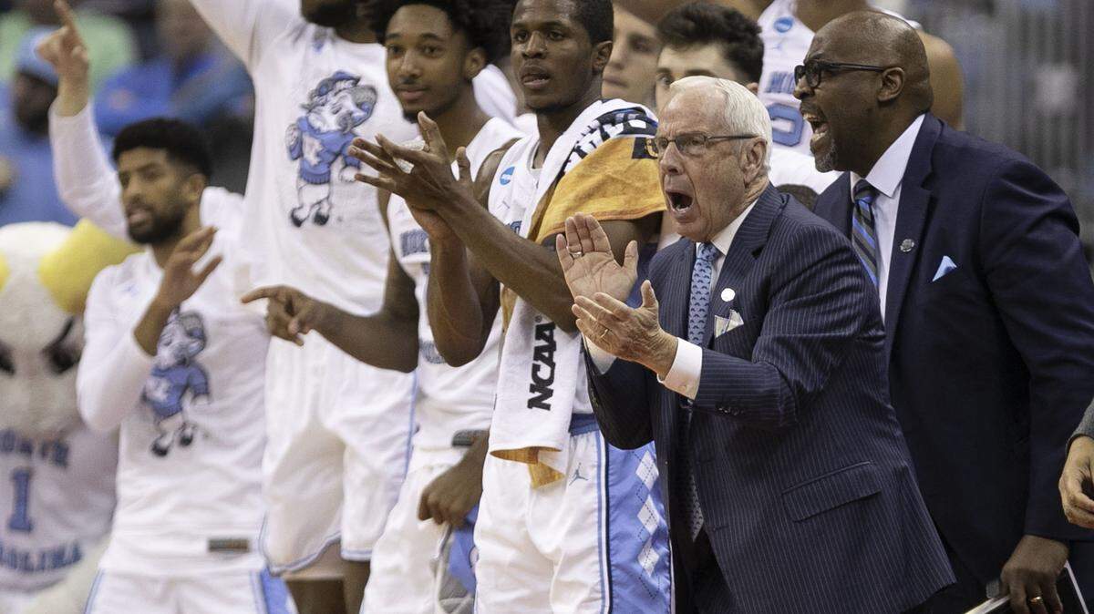 North Carolina coach Roy Williams applauds his team’s performance during the first half against Washington in the second round of the NCAA Tournament on Sunday, March 24, 2019 at Nationwide Arena in Columbus, Ohio.