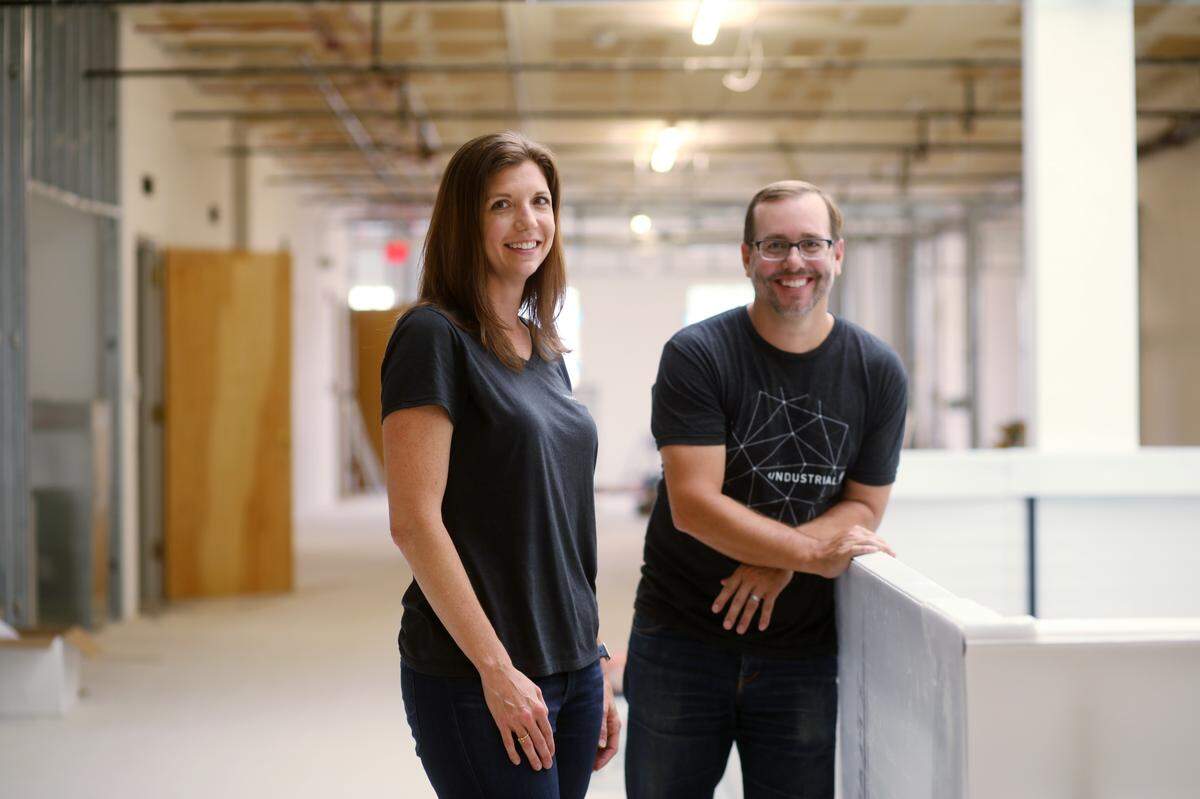 Ndustrial.Io COO Natalie Birdwell, left, and CEO Jason Massey, in the company’s new office in downtown Raleigh Wednesday, Sept. 4, 2019, that is currently under construction. Ndustrial.Io is a relatively young startup that is expanding.
