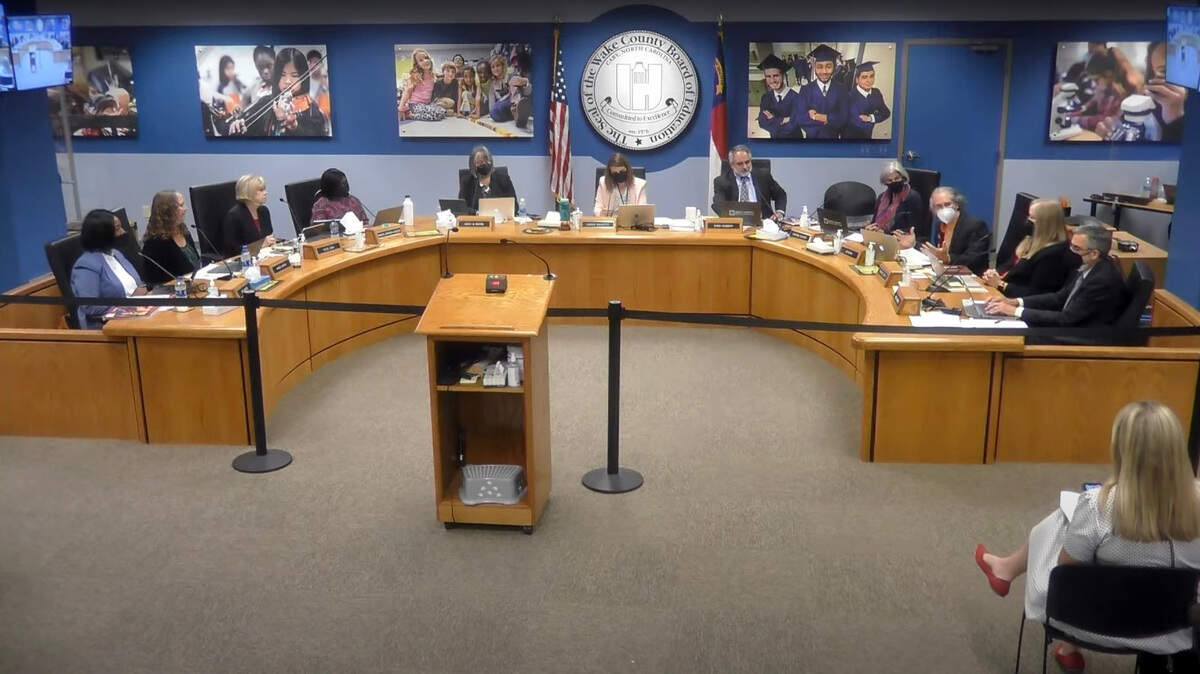 Members of the Wake County School Board discuss an item on the agenda at the June 7, 2022 meeting.