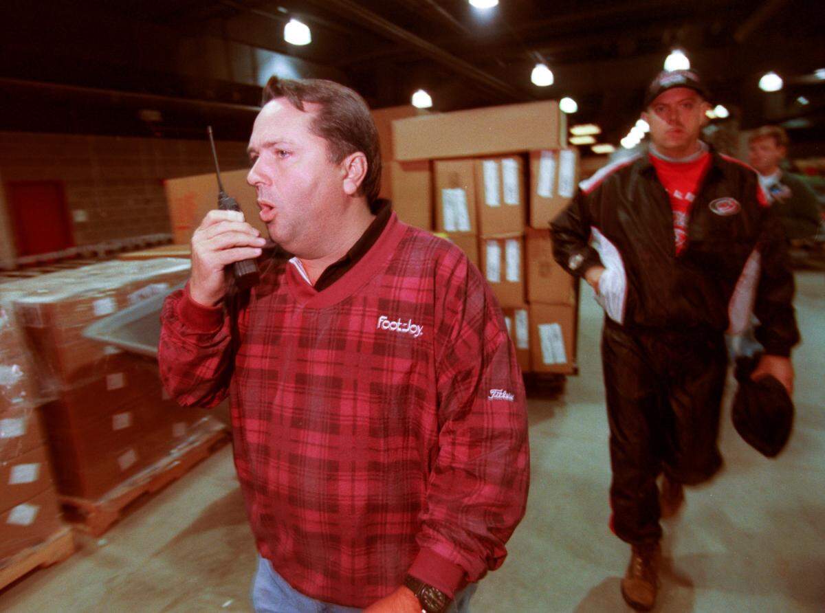 Dave Olsen, Operations Director at the new Entertainment and Sports Arena, rushes through a lower level area while talking on his two-way radio on opening night for the new facility in 1999.