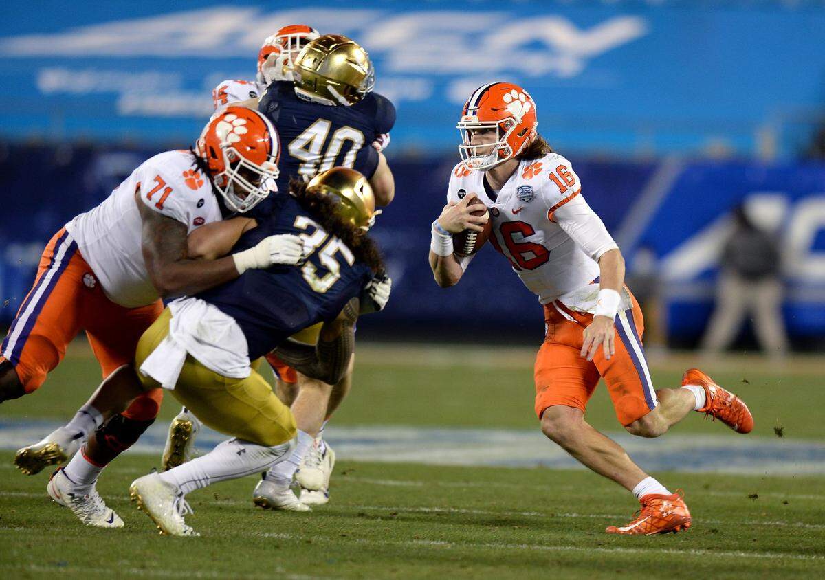 Former Clemson quarterback Trevor Lawrence rushes for a touchdown during the third quarter of the ACC Championship game against Notre Dame last December in Charlotte.