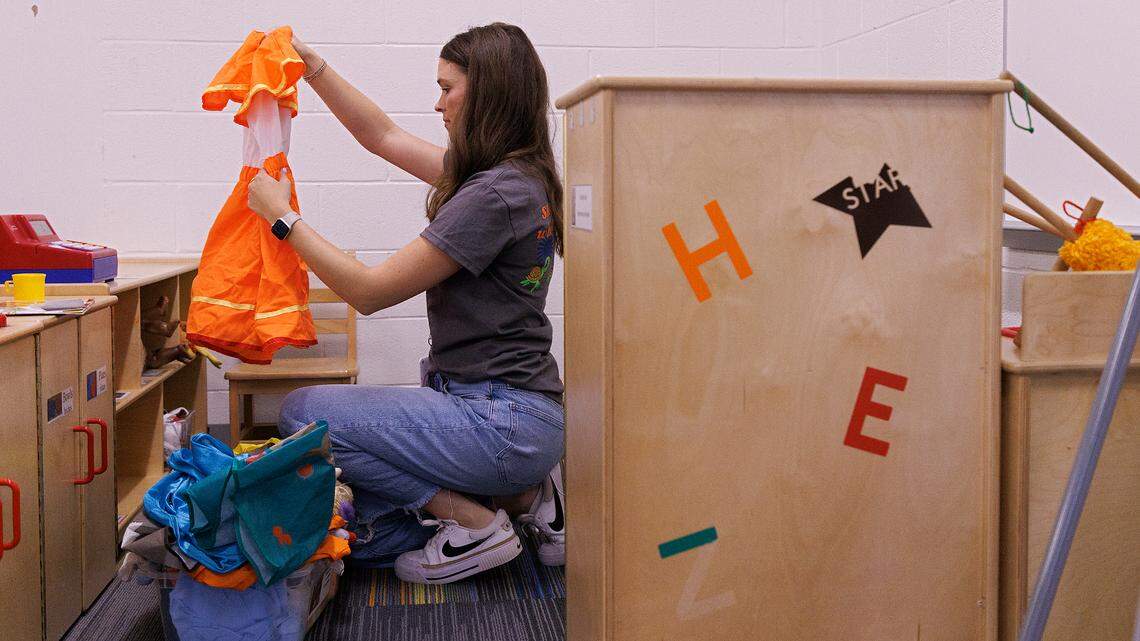 Emily Brugler, a first-year pre-kindergarten teacher, prepares her classroom at South Lakes Elementary School on Thursday, Aug. 22, 2024, in Fuquay-Varina, N.C.