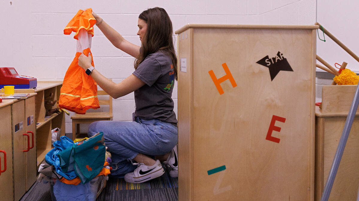 Emily Brugler, a first-year pre-kindergarten teacher, prepares her classroom at South Lakes Elementary School on Thursday, Aug. 22, 2024, in Fuquay-Varina, N.C.