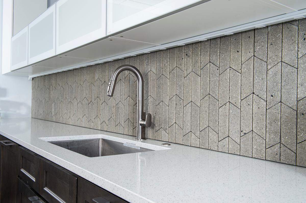 A tile backsplash made from Biomason cement.