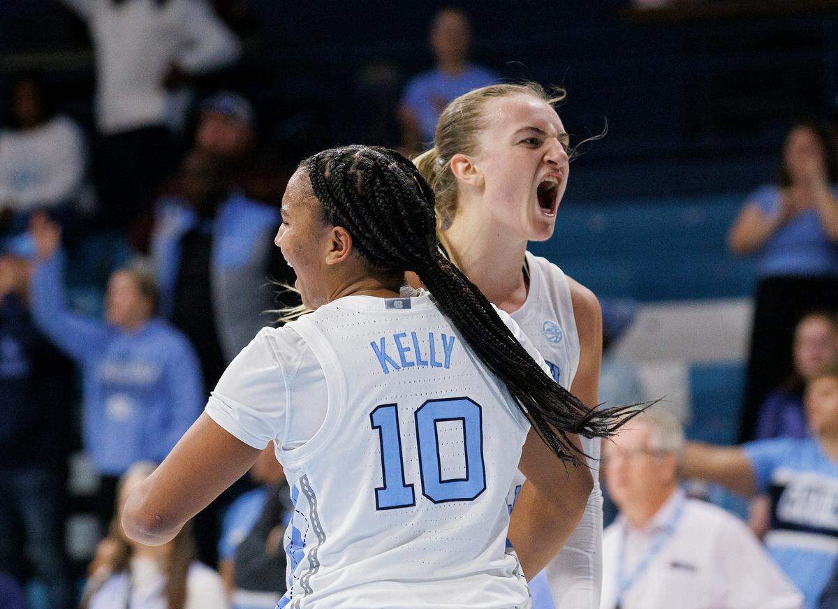 North Carolina’s Reniya Kelly and Alyssa Ustby react in the closing seconds of the Tar Heels’ 72-53 win over Kentucky on Thursday, Dec. 5, 2024, at Carmichael Arena in Chapel Hill, N.C.