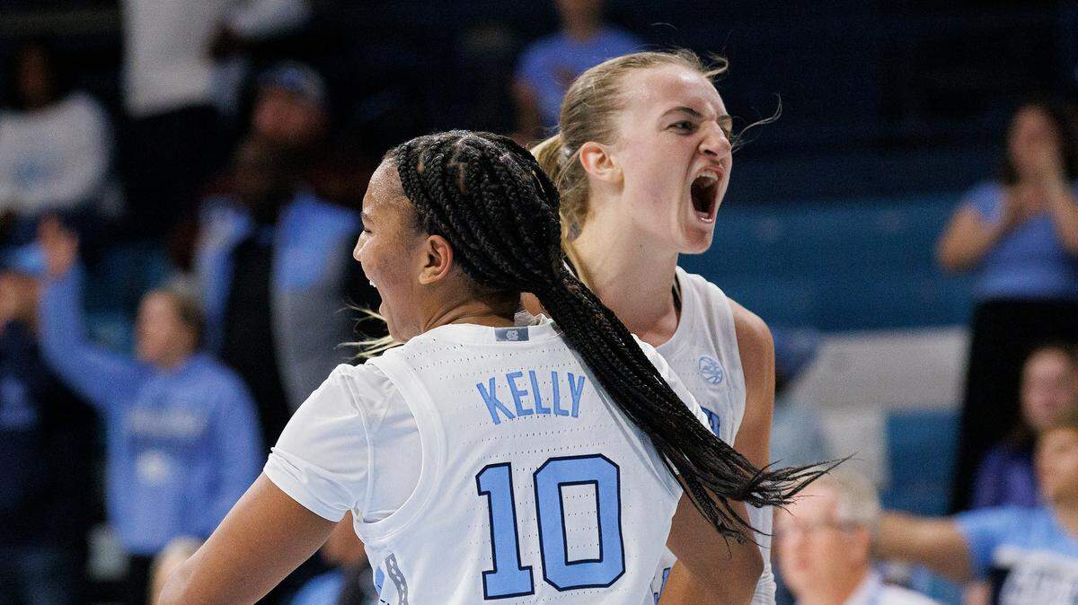 North Carolina’s Reniya Kelly and Alyssa Ustby react in the closing seconds of the Tar Heels’ 72-53 win over Kentucky on Thursday, Dec. 5, 2024, at Carmichael Arena in Chapel Hill, N.C.