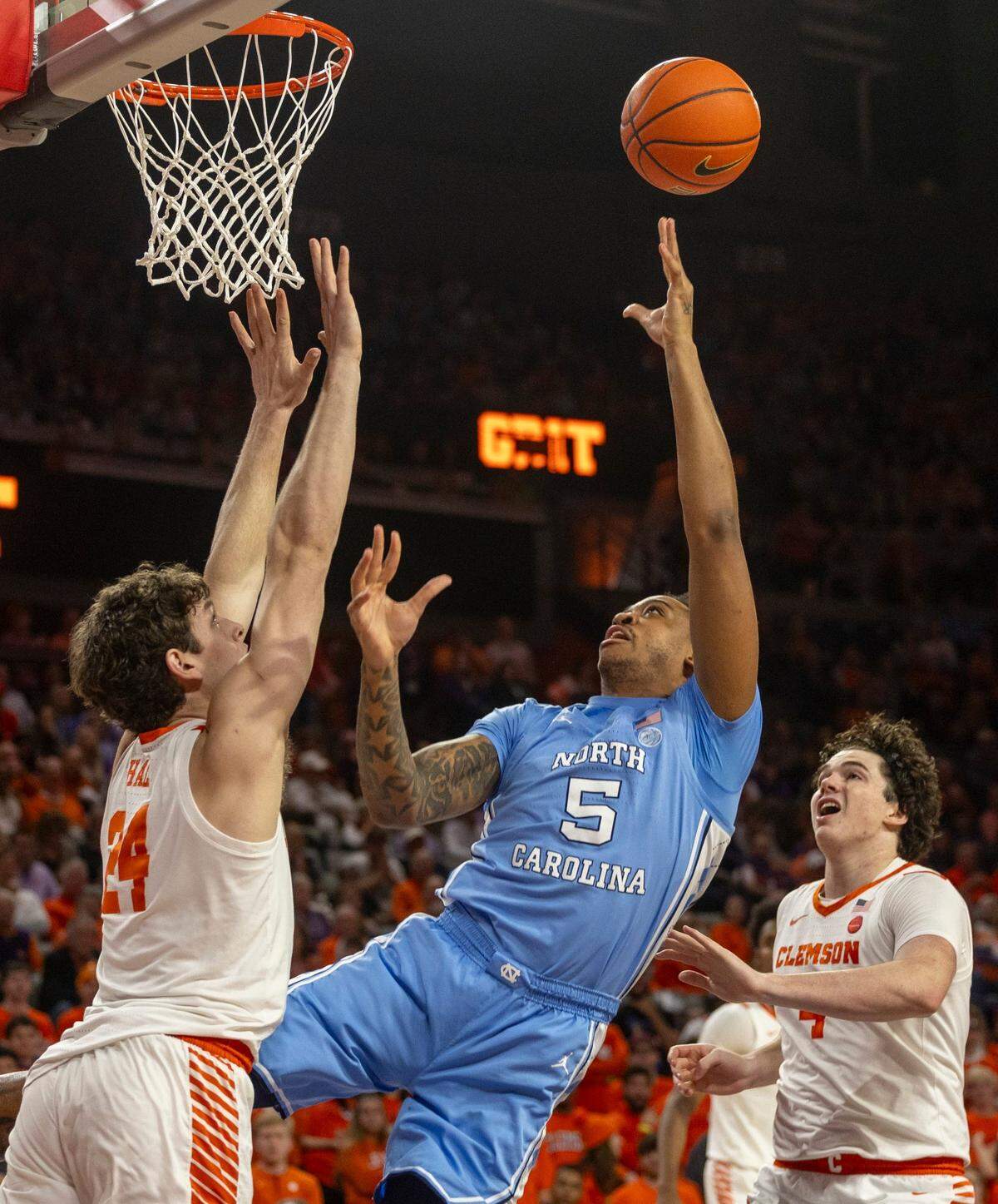 North Carolina’s Armando Bacot (5) puts up a shot against Clemson’s P.J. Hall (24) during the first half on Saturday, January 6, 2024 at Littlejohn Coliseum in Clemson, S.C.