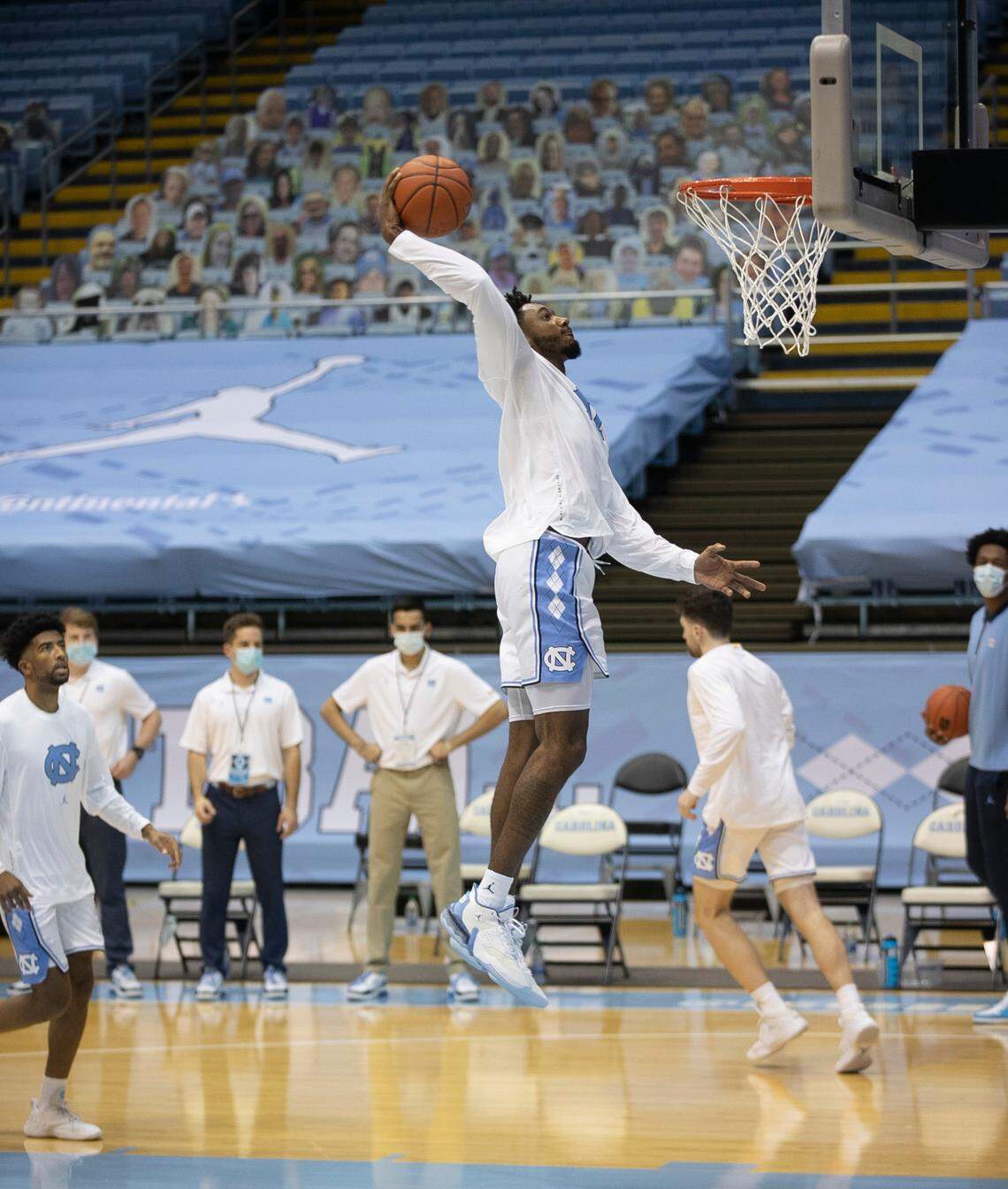 The North Carolina’s Leaky Black (1) goes up for a dunk during warm ups for the season opening game against College of Charleston on Wednesday, November 25, 2020 at the Smith Center in Chapel Hill, N.C.