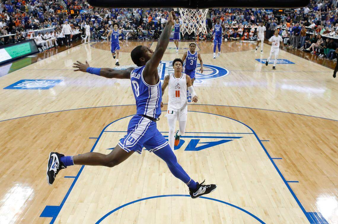 Duke’s Dariq Whitehead (0) can’t put the dunk into the basket in the final seconds of Duke’s 85-78 victory over Miami in the semifinals of the ACC Men’s Basketball Tournament in Greensboro, N.C., Friday, March 10, 2023.