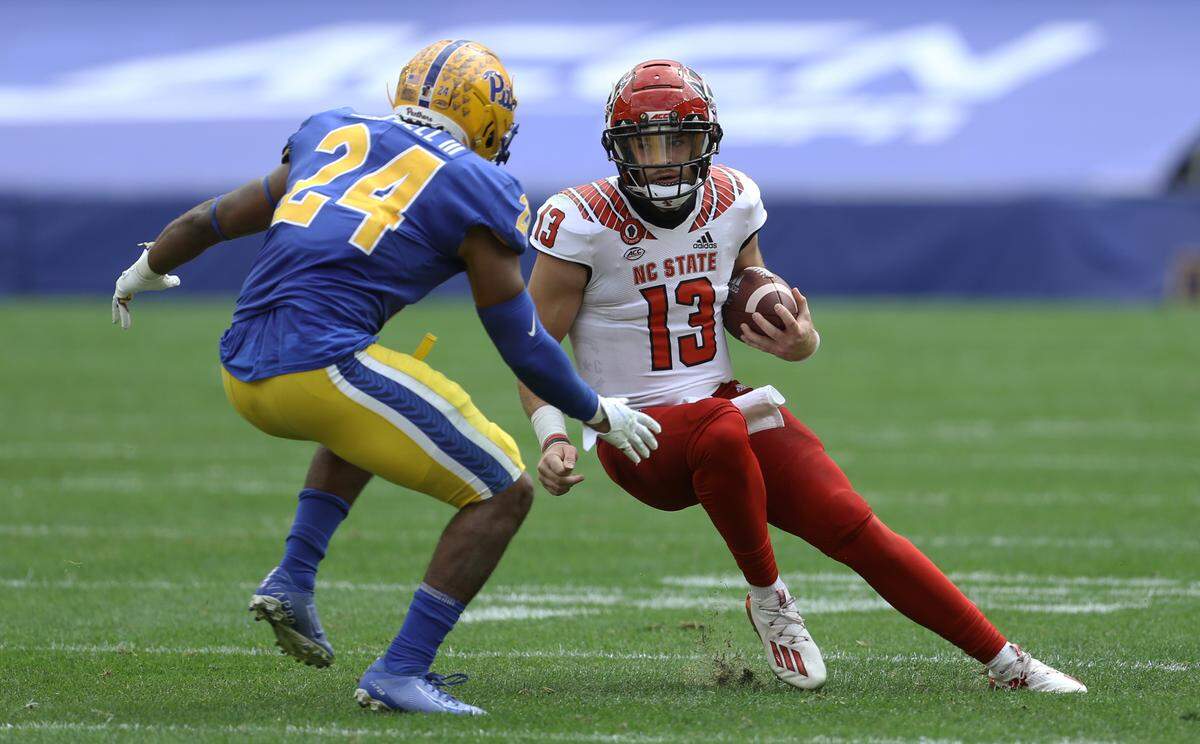 Pittsburgh Panthers linebacker Phil Campbell III (24) sacks N.C. State quarterback Devin Leary (13) during the first quarter at Heinz Field.