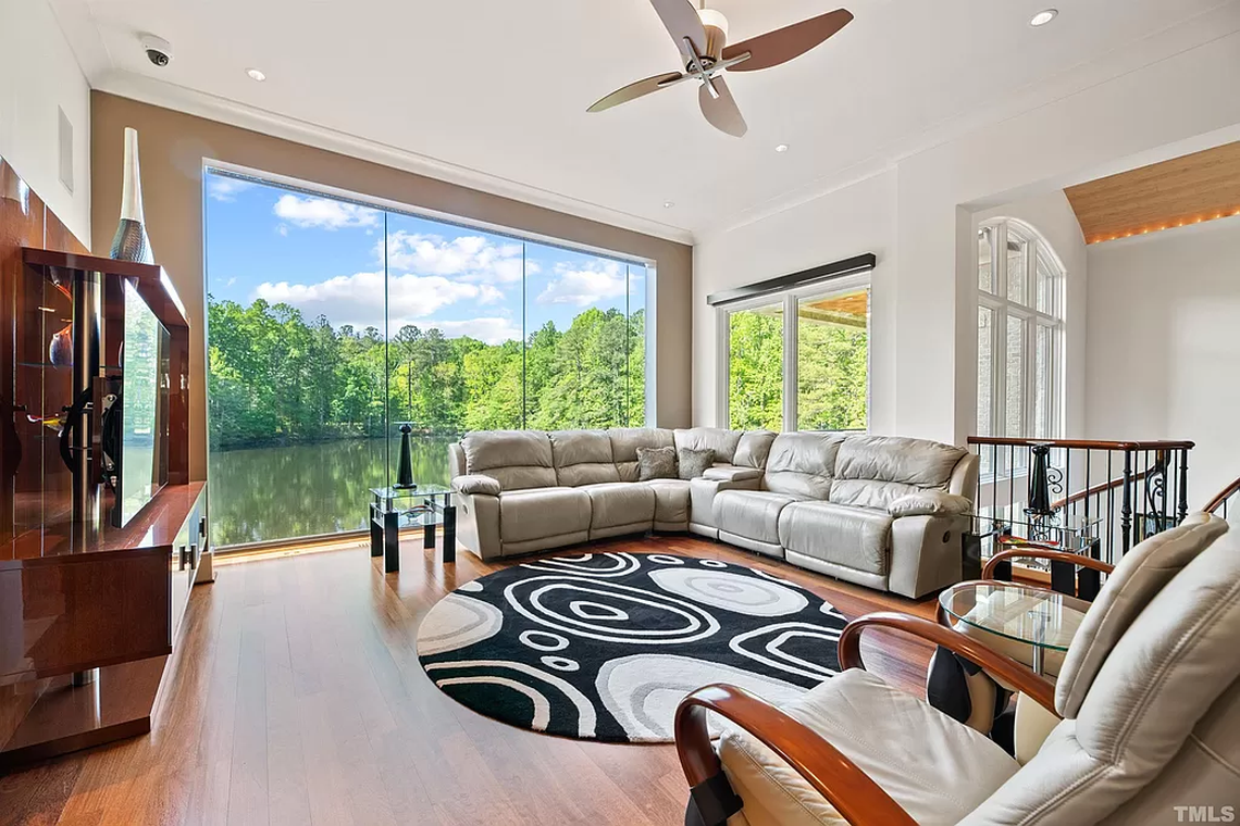 The house is outfitted with double-pane thermal windows and sliding doors. Many rooms have natural light streaming in from more than one direction.