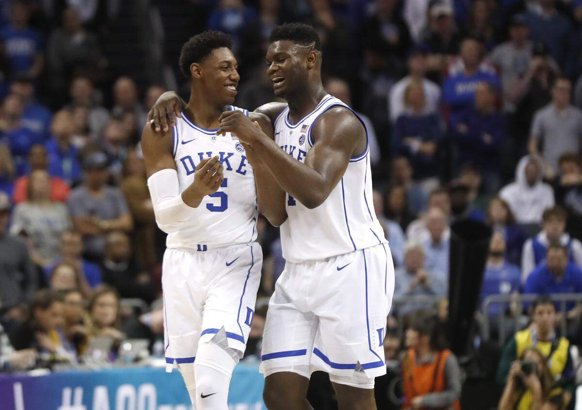 Duke’s RJ Barrett (5) laughs with Duke’s Zion Williamson (1) late in the second half of Duke’s 73-63 victory over Florida State in the finals of the 2019 ACC Tournament in Charlotte. Williamson had 21 points in the win and Barrett had 18.