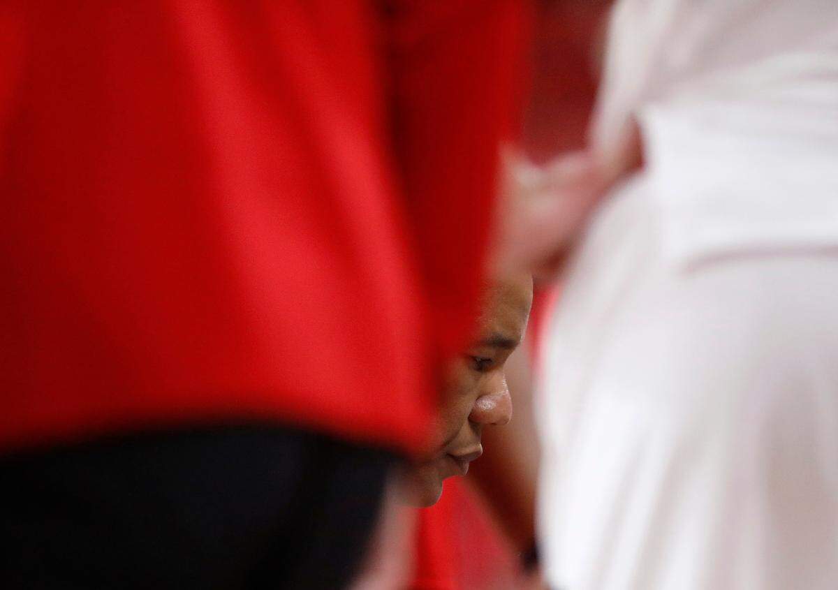 N.C. State head coach Kevin Keatts huddles with his team during a timeout in the second half of the Wolfpack’s 81-72 win over Presbyterian on Friday, Nov. 8, 2024, at Lenovo Center in Raleigh, N.C.