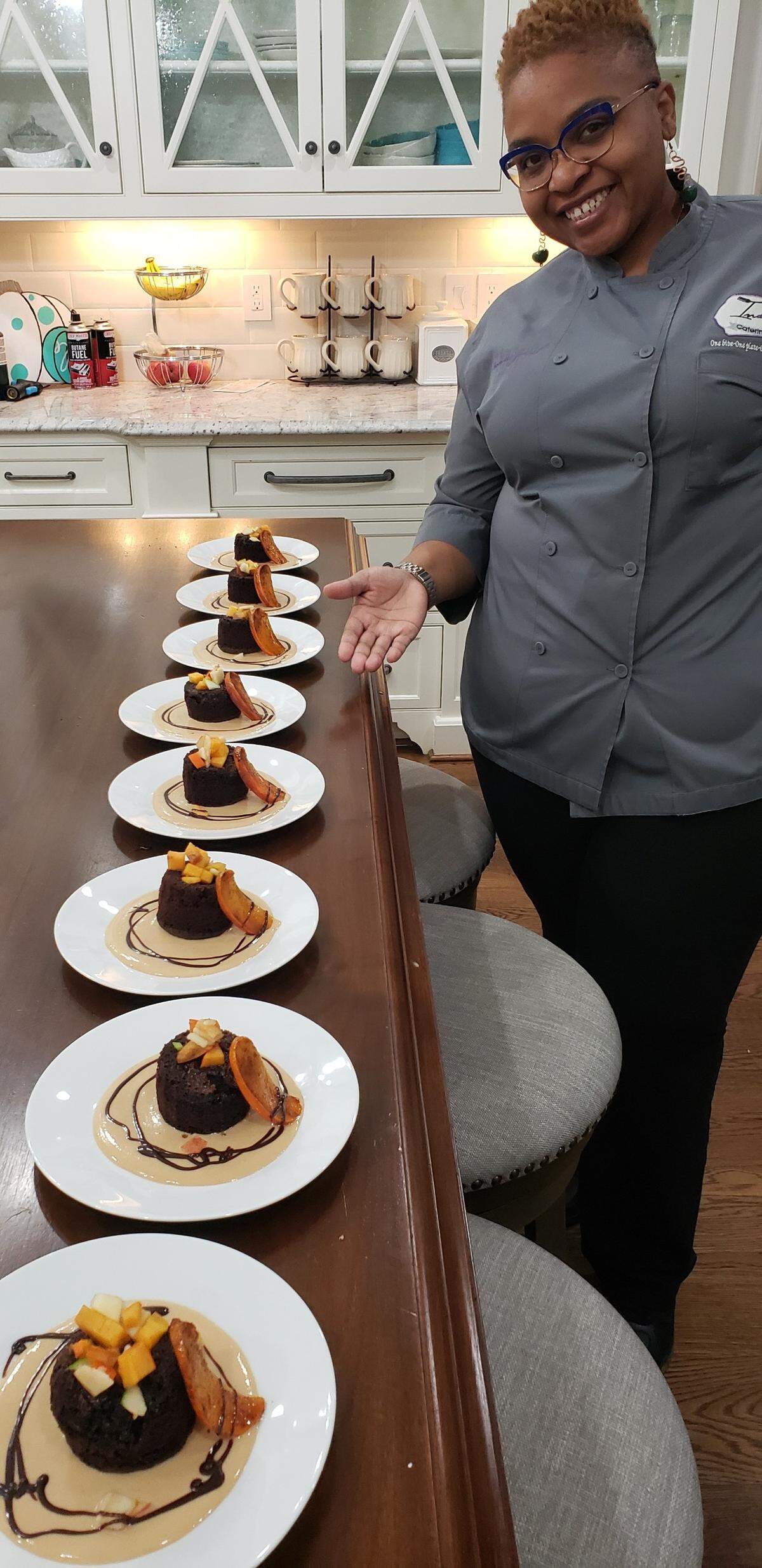 Chef Queen Precious-Jewel Zabriskie, pictured, owns Indulge Catering LLC with Jacqueline “Jay” White.