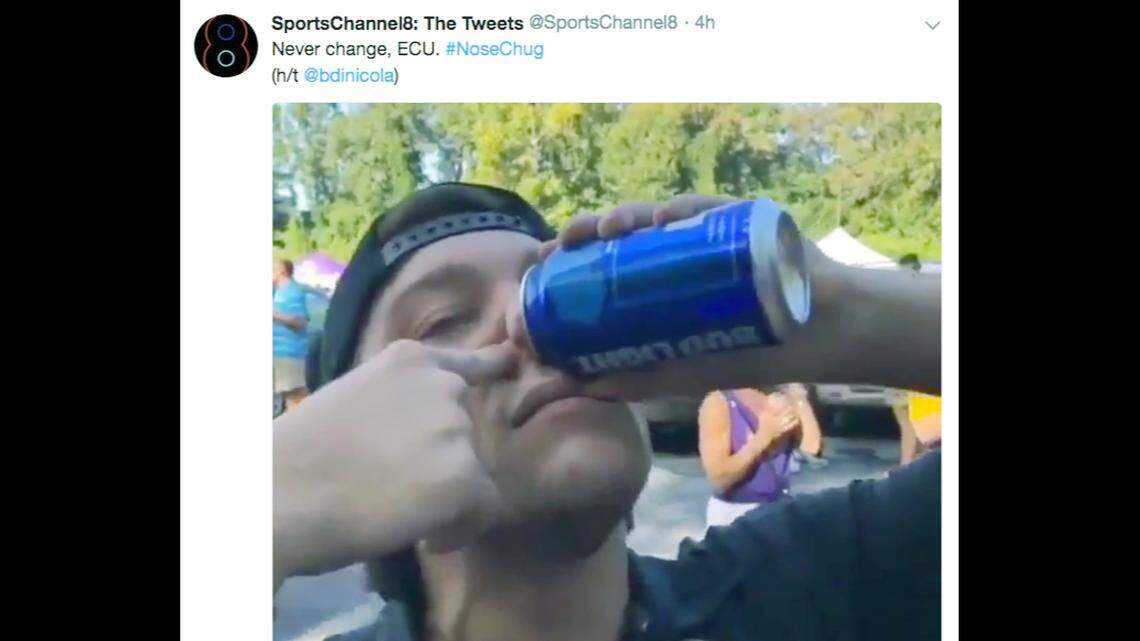 A screenshot of a video apparently showing an ECU fan chugging a beer through his nose.