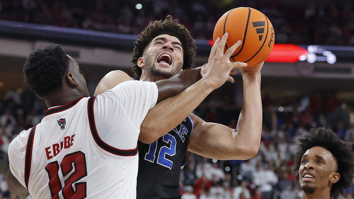 Duke’s Cameron Boozer is fouled by NC State's Scottie Ebube during the first half of the Blue Devils’ game on Monday, March 2, 2026, at Lenovo Center in Raleigh, N.C. 