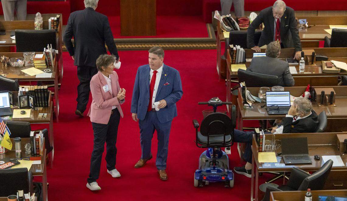 Rep. Pricey Harrison talks with Rep. Brenden H. Jones prior to the House session on Wednesday, October 22, 2025 at the General Assembly in Raleigh, N.C.