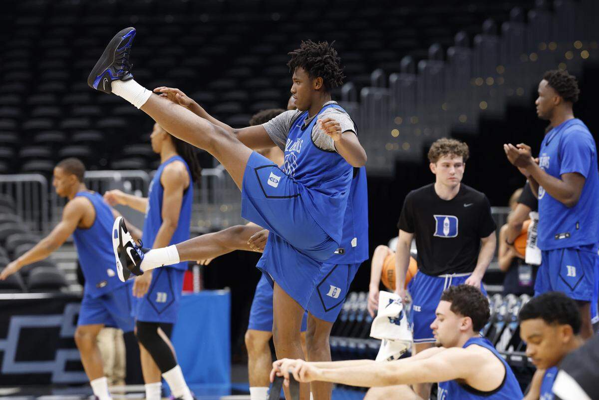 Duke’s Patrick Ngongba II stretches before Duke’s practice at Capital One Arena in Washington, D.C., Thursday, March 26, 2026. The Blue Devils face St. John’s in the Sweet 16 of the NCAA Men’s Basketball East Regional Friday.