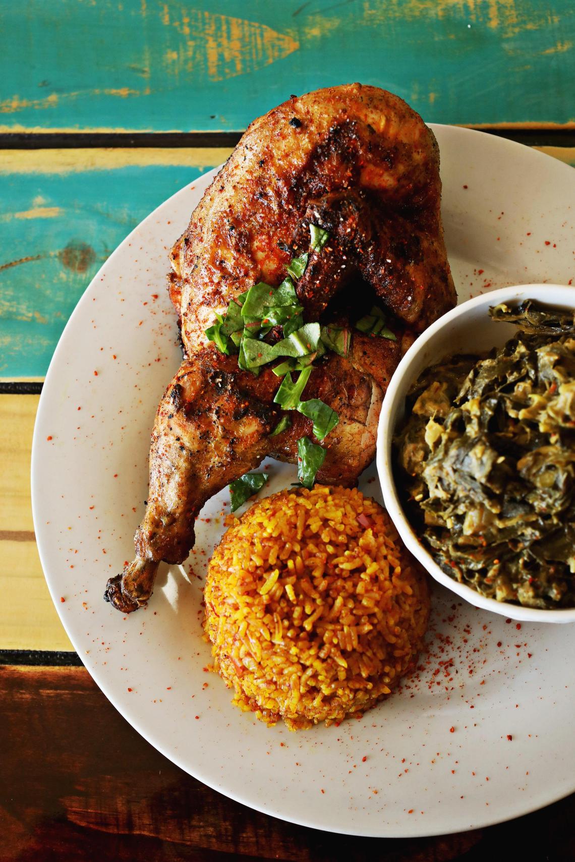 Zweli’s in Durham serves a half-chicken with a side of collard greens cooked with peanut butter and Jollof rice. It’s an example of a cuisine that Greg Cox sampled for the first time.