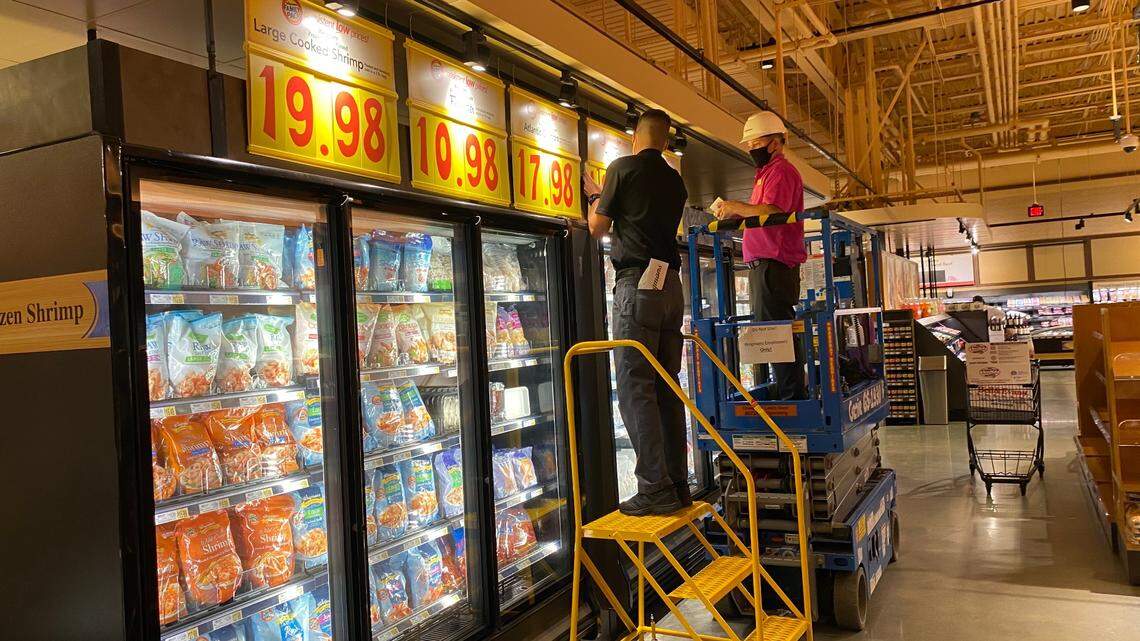 Employees work on July 27, 2020, to ready the Wegmans grocery store in West Cary for its grand opening on July 29, 2020.
