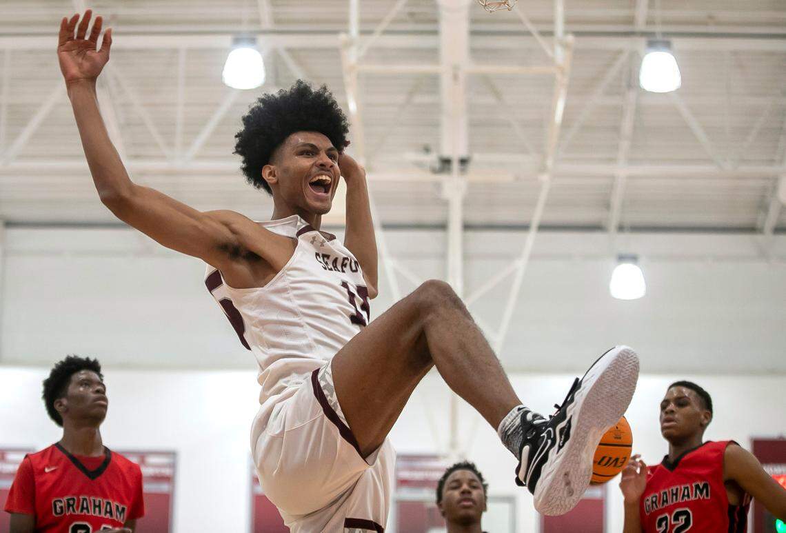 Seaforth High School’s Jarin Stevenson (15) reacts after a dunk during a 75-48 victory over Graham High School on January 13, 2023 in Pittsboro, N.C.