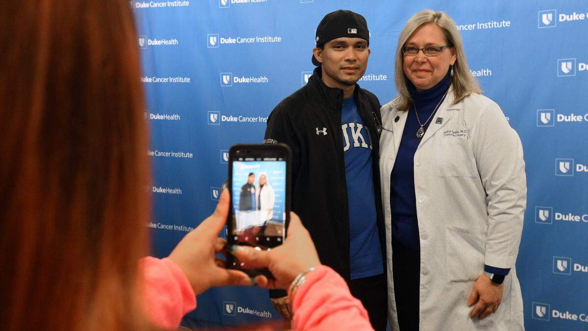 Johnathan Nauta (left) has a photo made with Dr. Debra Sudan, chief of abdominal Transplant Surgery at Duke Medical Center Thursday, Nov. 15, 2018 in Durham, N.C. Nauta received the first abdominal wall transplant in the Carolinas thanks to an organ donor and a medical team at Duke University Hospital.Nauta, 37, of Fayetteville, received a simultaneous abdominal wall and bowel transplant on Oct. 12 at Duke that lasted 14 hours and involved a team of 25 doctors, nurses and staff.The organ donor was Marcus Scales, 13, a middle school student in Rockingham County who died on Oct. 10.