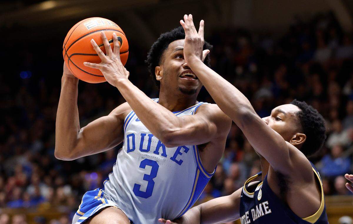 Duke’s Jeremy Roach (3) drives past Notre Dame’s Marcus Hammond (10) during the first half of Duke’s game against Notre Dame at Cameron Indoor Stadium in Durham, N.C., Tuesday, Feb. 14, 2023.