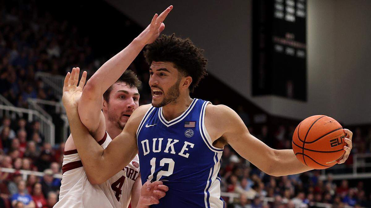 Duke’s Cameron Boozer is guarded by Stanford’s AJ Rohosy during the second half at Stanford Maples Pavilion on January 17, 2026 in Palo Alto, California.  