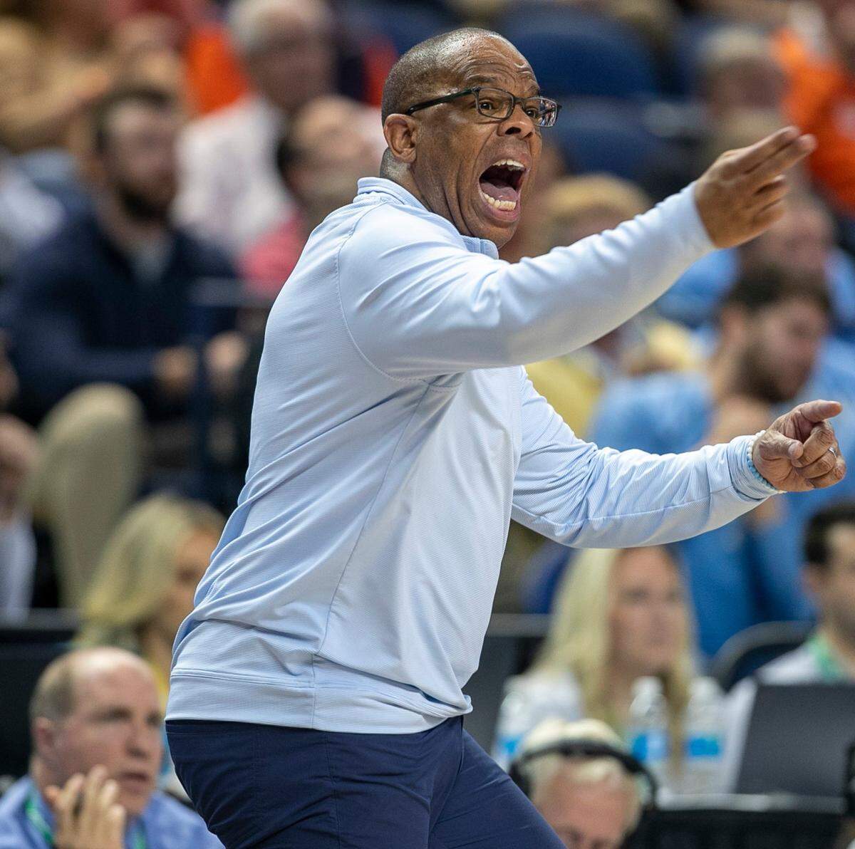 North Carolina coach Hubert Davis directs his team on offense during the first half against Virginia during the third round of the ACC Tournament on Thursday, March 9, 2023 at the Greensboro Coliseum in Greensboro, N.C.