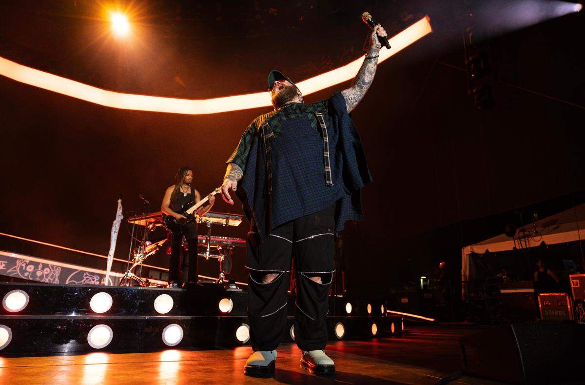 Teddy Swims works the crowd performing “Apple Juice” in concert, Saturday night, May 17, 2025 at Raleigh, N.C.’s Red Hat Amphitheater.