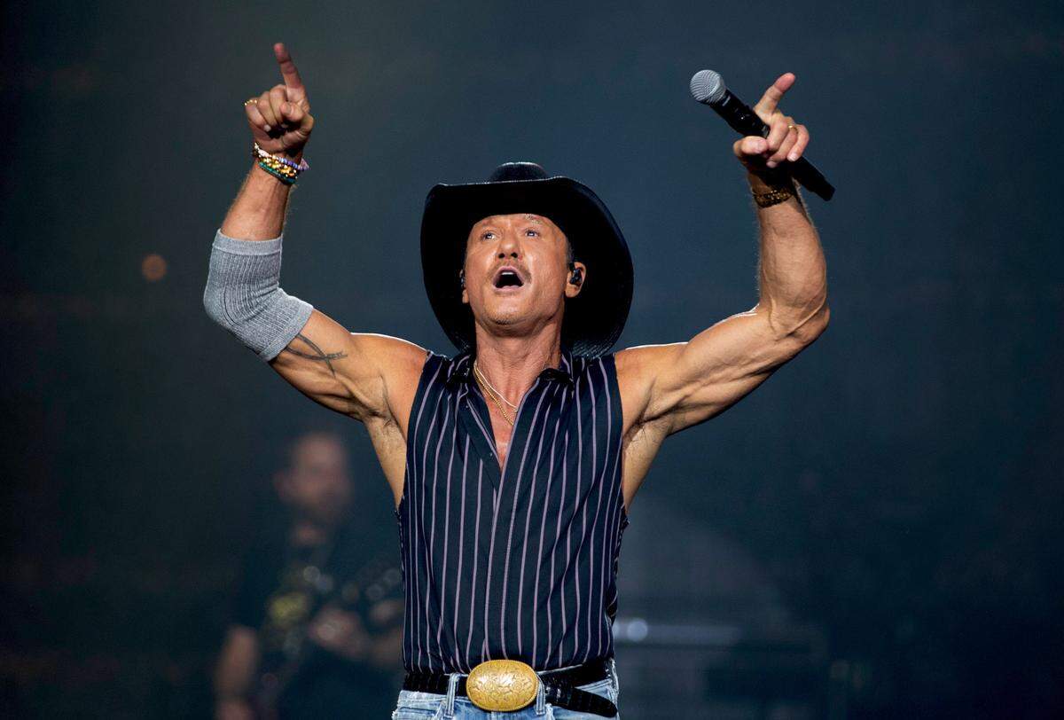 Tim McGraw acknowledges the crowd as he brings his “Standing Room Only Tour” to Raleigh, N.C.’s PNC Arena, Saturday, June 22, 2024.