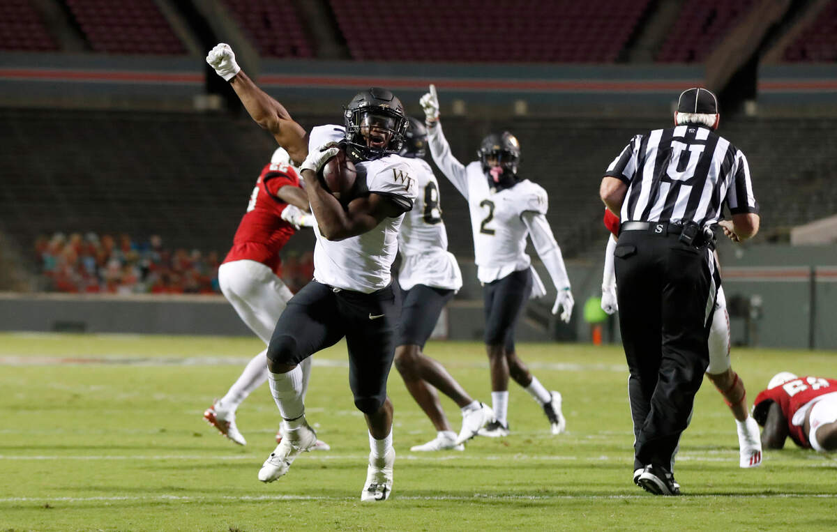 Wake Forest running back Kenneth Walker III (9) before scoring on a 13-yard touchdown run during the second half of N.C. State’s 45-42 victory over Wake Forest at Carter-Finley Stadium in Raleigh, N.C, Saturday, Sept. 19, 2020.