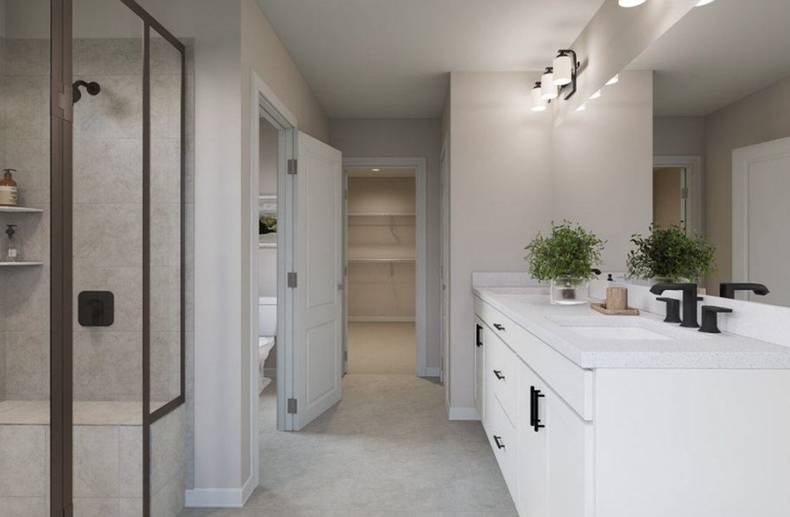 Inside a master bathroom at Silverstone Terraces at 457 Rowe Way, Knightdale.