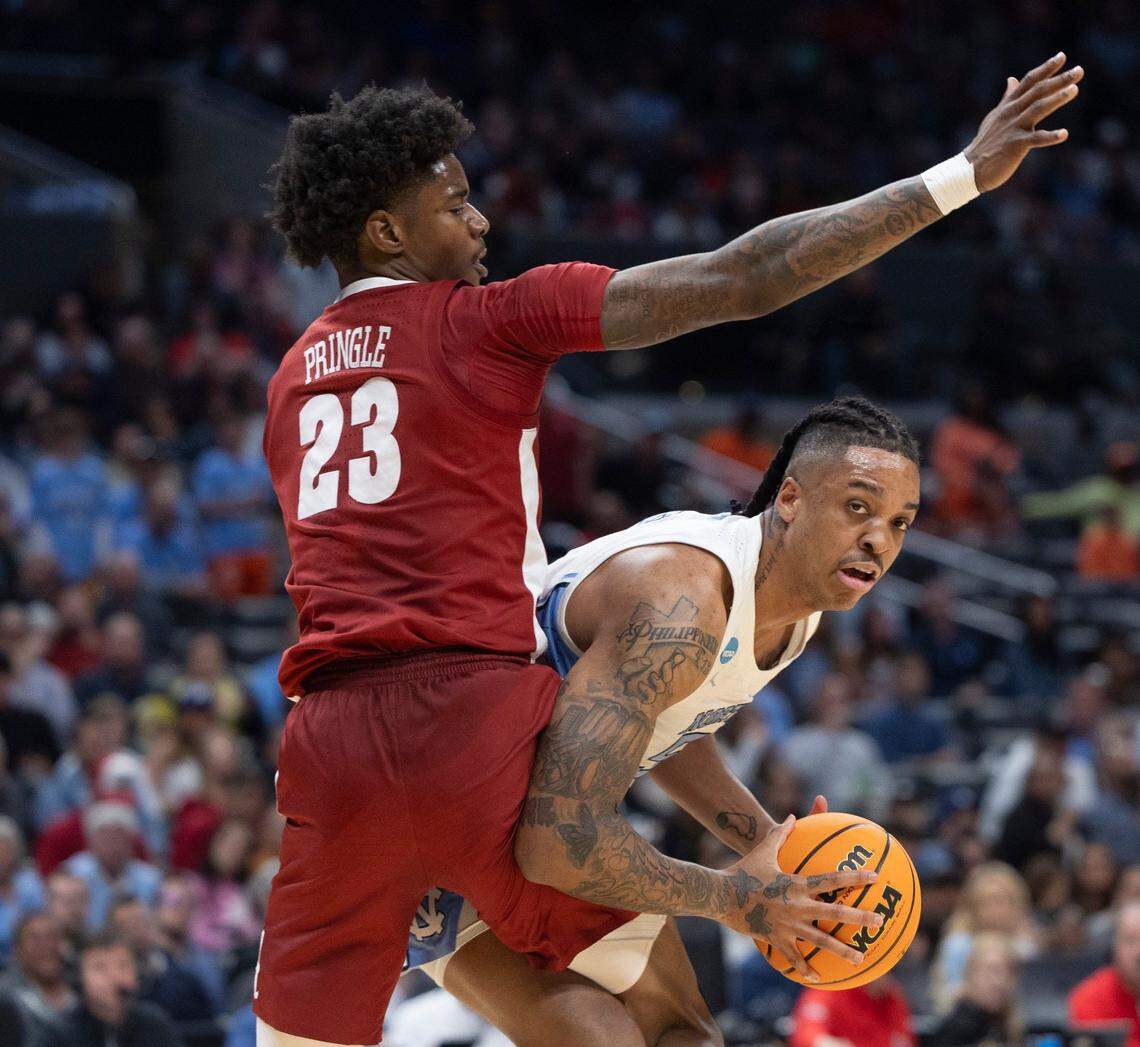 Alabama’s Nick Pringle (23) defends North Carolina’s Armando Bacot (5) in the first half during the NCAA Sweet Sixteen on Thursday, March 28, 2024 at Crypto.com Arena in Los Angeles, CA.