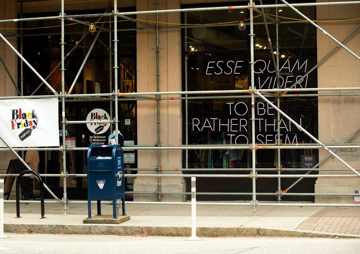 Scaffolding covers the exterior of the Black Friday Market, which opened the storefront downtown in December 2019 to sell products and art from small, mostly Black-owned businesses, on Wednesday, Aug 4, 2021, in Raleigh, N.C.