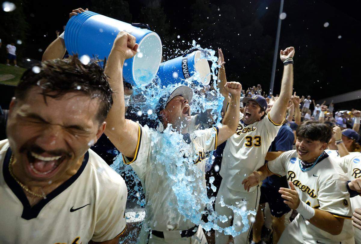 Murray State coach Dan Skirka gets a Powerade bath after Murray State’s 5-4 victory over Duke in the third game of the Durham Super Regional at Jack Coombs Field in Durham, N.C., Monday, June 9, 2025.
