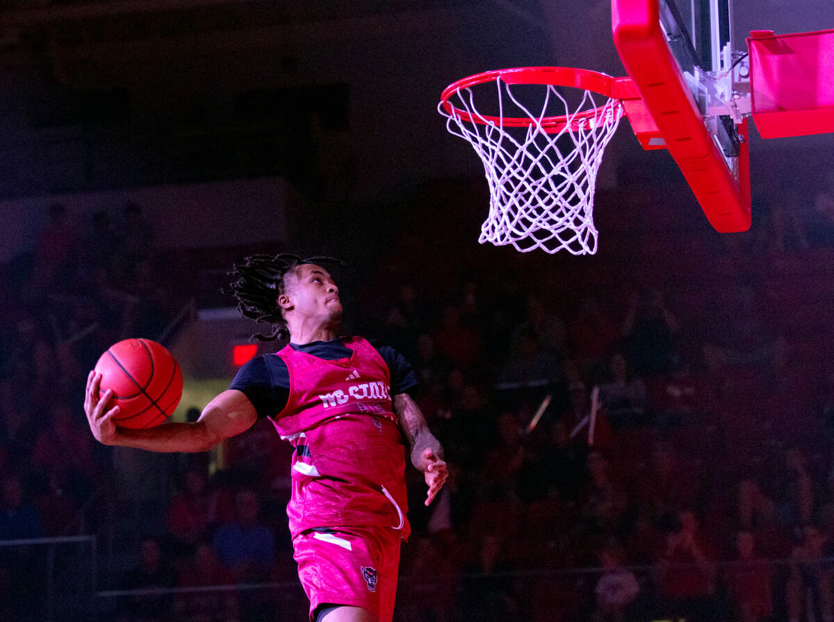 N.C. State’s Breon Pass goes up for a dunk during the “Primetime with the Pack” preseason event on Thursday, Oct. 26, 2023, at Reynolds Coliseum in Raleigh, N.C.