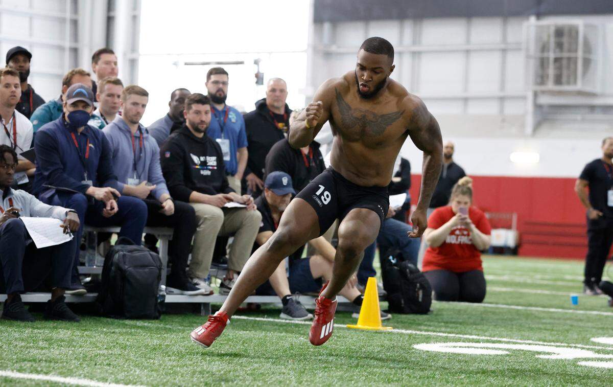 N.C. State’s Isaiah Moore runs the 20-yard shuttle during the Wolfpack’s Pro Day at the Close-King Indoor Facility in Raleigh, N.C., Tuesday, March 28, 2023.