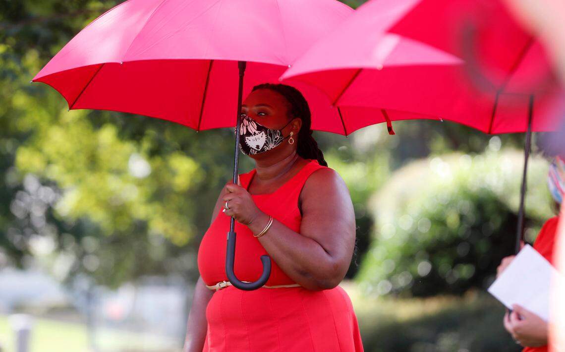 Tamika Walker Kelly, president of the North Carolina Association of Educators, stands outside of the Legislative Building during a press conference on the first day of a brief session Wednesday, Sept. 2, 2020.