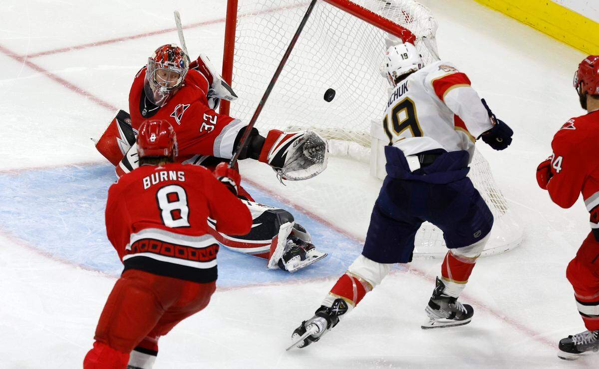 Florida left wing Matthew Tkachuk (19) scores on Carolina goaltender Antti Raanta (32) during the overtime of the Panthers’ 2-1 overtime victory over the Hurricanes in the Eastern Conference Finals at PNC Arena in Raleigh, N.C., Saturday, May 20, 2023.