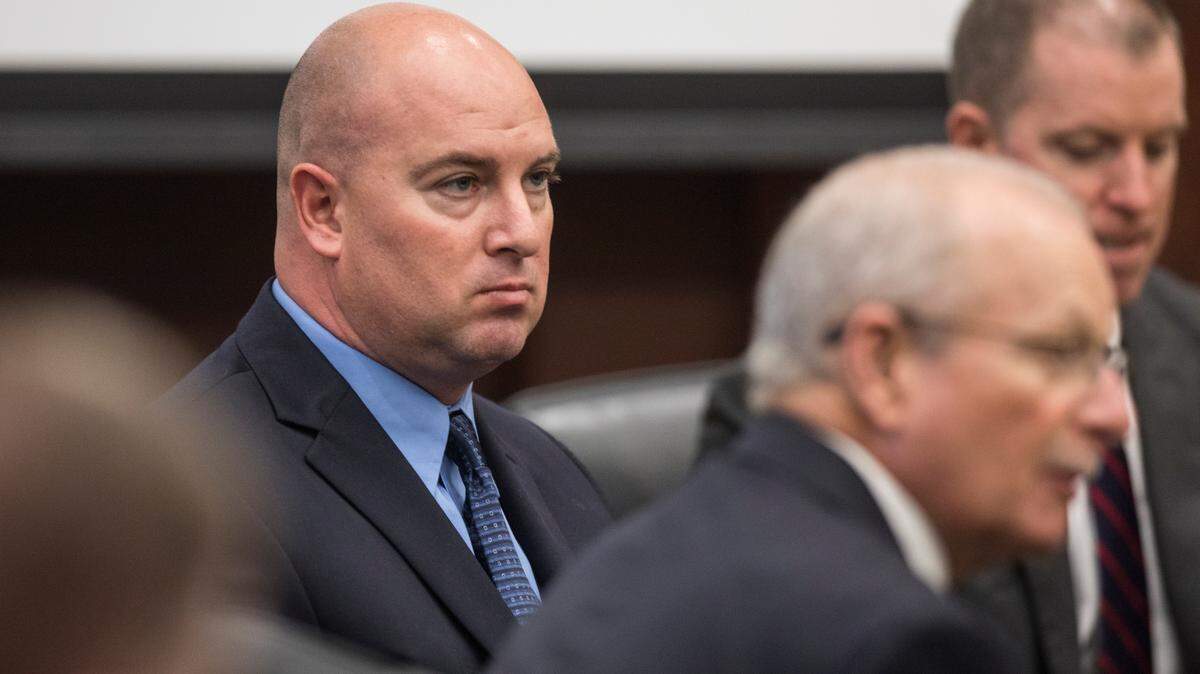Cameron Broadwell, the Wake County sheriff’s deputy charged with felony assault for turning his K9-unit dog on Kyron Hinton, waits for his trial to resume after lunch in the Wake County Justice Center on Thursday, May 9, 2019.
