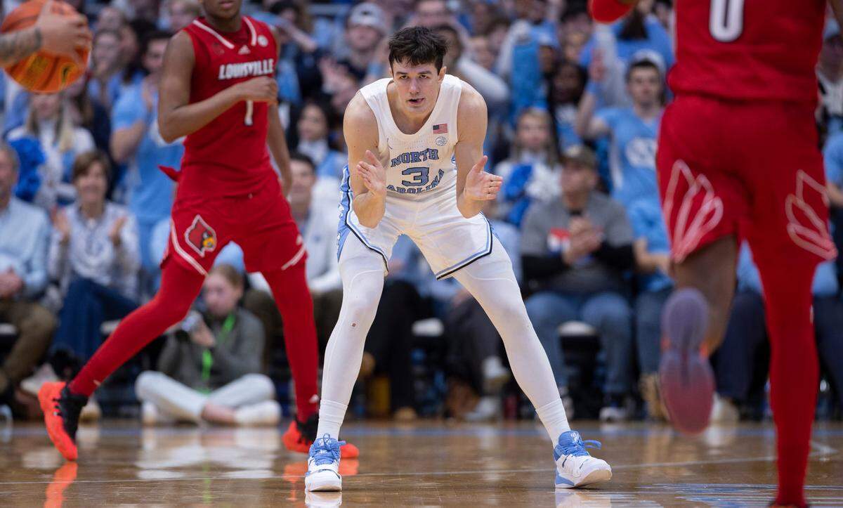 North Carolina’s Cormac Ryan (3)reacts after singing a three-point basket in the first half against Louisville on Wednesday, January 17, 2024 at the Smith Center in Chapel Hill, N.C. Ryan scored 14 points.